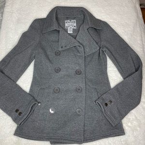 Fall/winter double breasted coat with detachable faux fur hood.